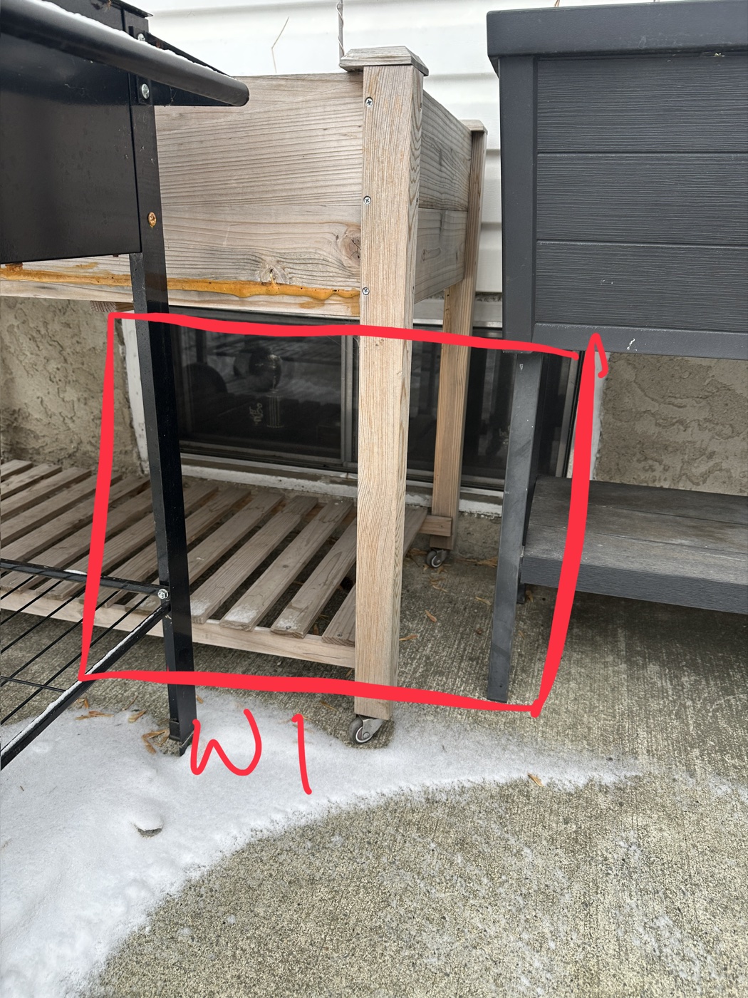 Exterior small basement window before egress replacement — Calgary home