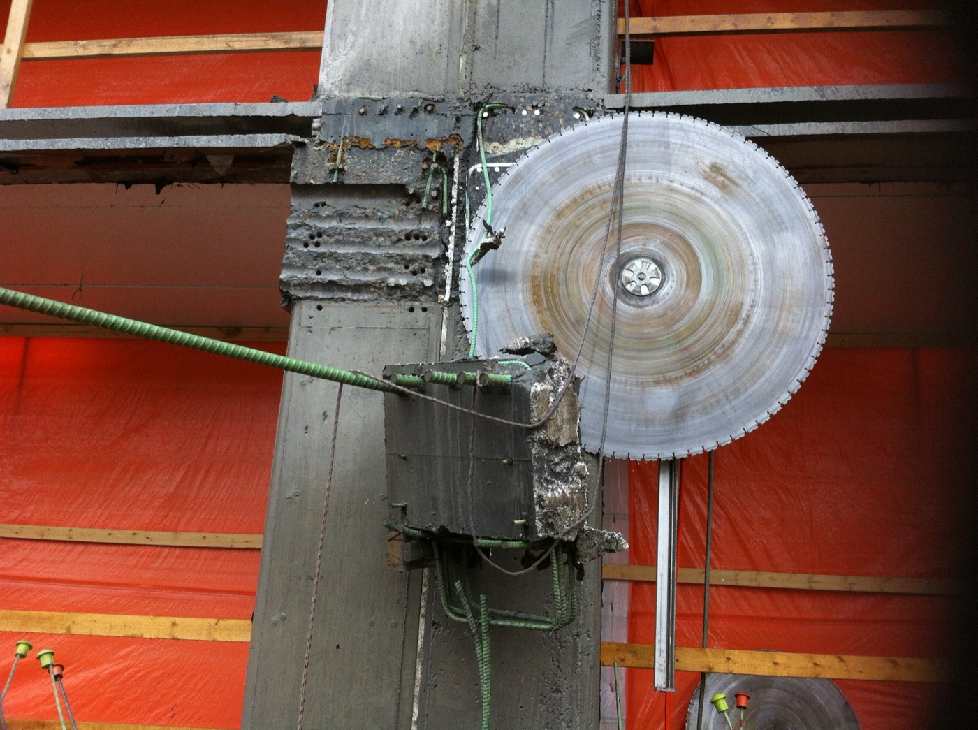 Diamond wall saw cutting concrete column — commercial concrete cutting Calgary