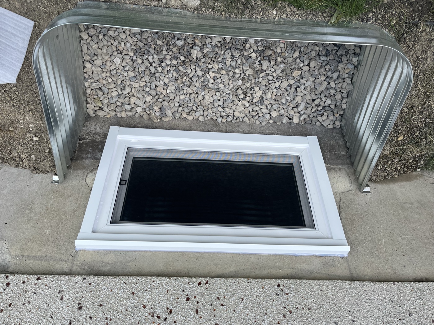 Egress window and galvanized window well completed — Calgary