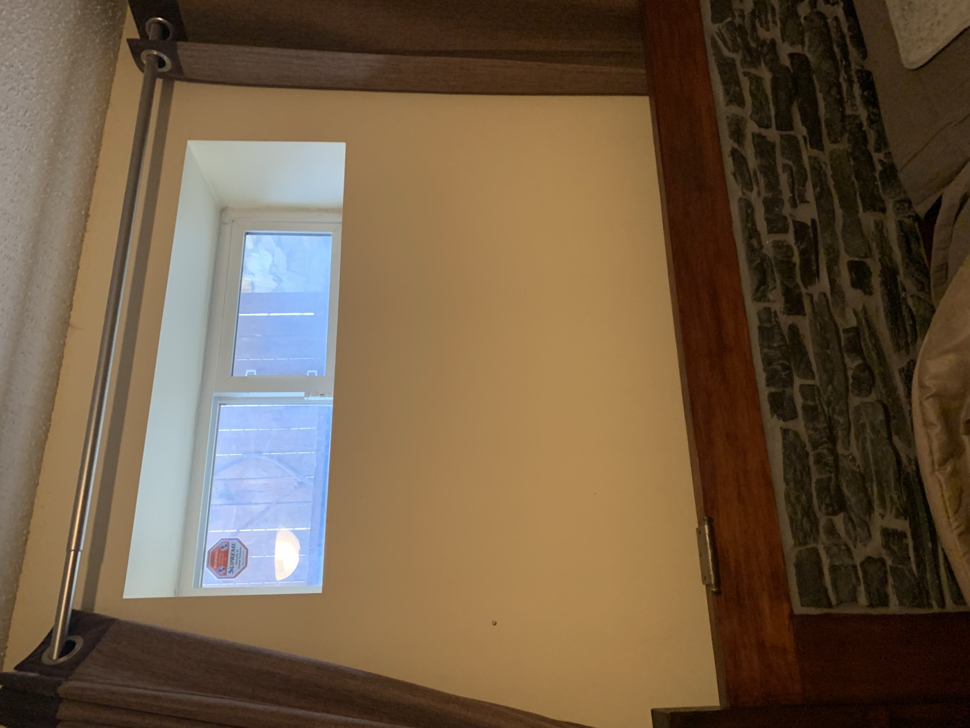 Old small basement windows before egress upgrade — Calgary home exterior