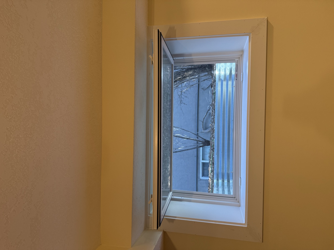 Hopper egress window interior finishing complete — Calgary