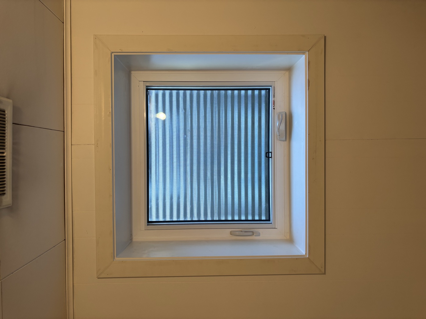 Clean interior window finish for legal basement suite — Calgary