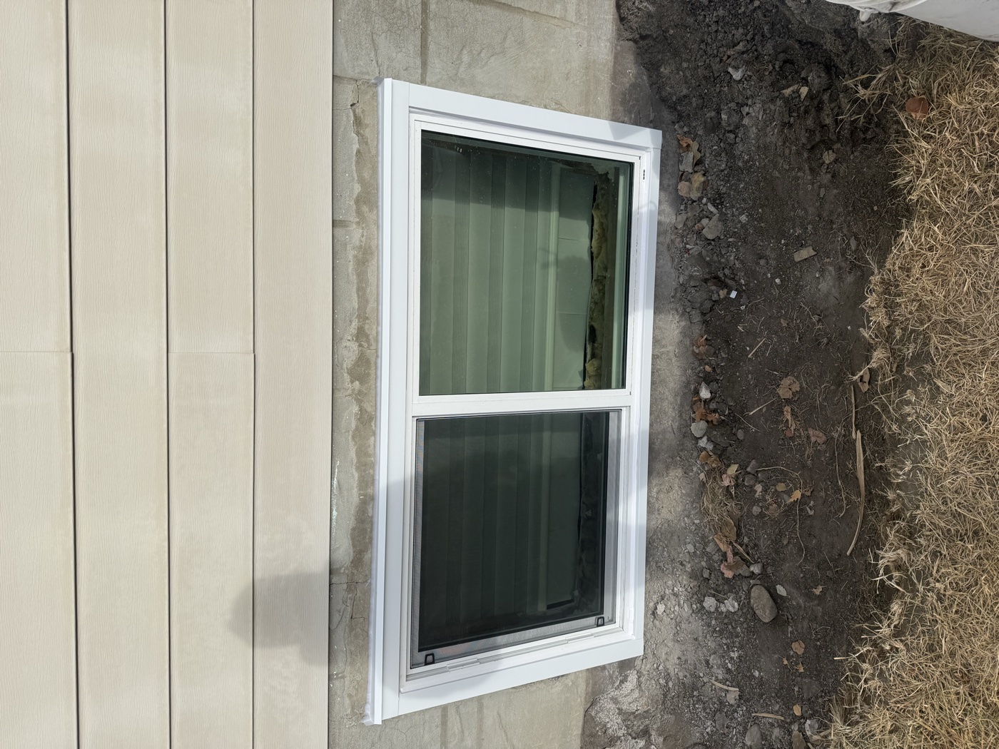 Egress single sliding window installed in Calgary basement